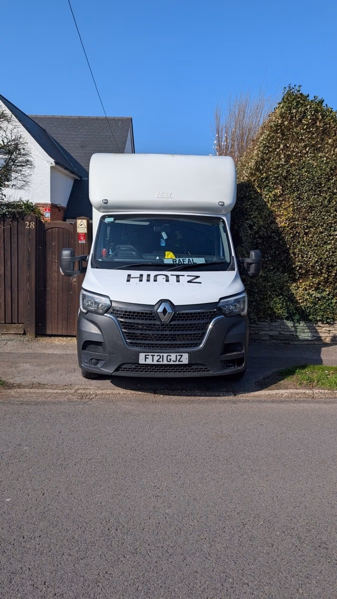 Hintz Removals Luton van parked on Castle Lane, Bournemouth